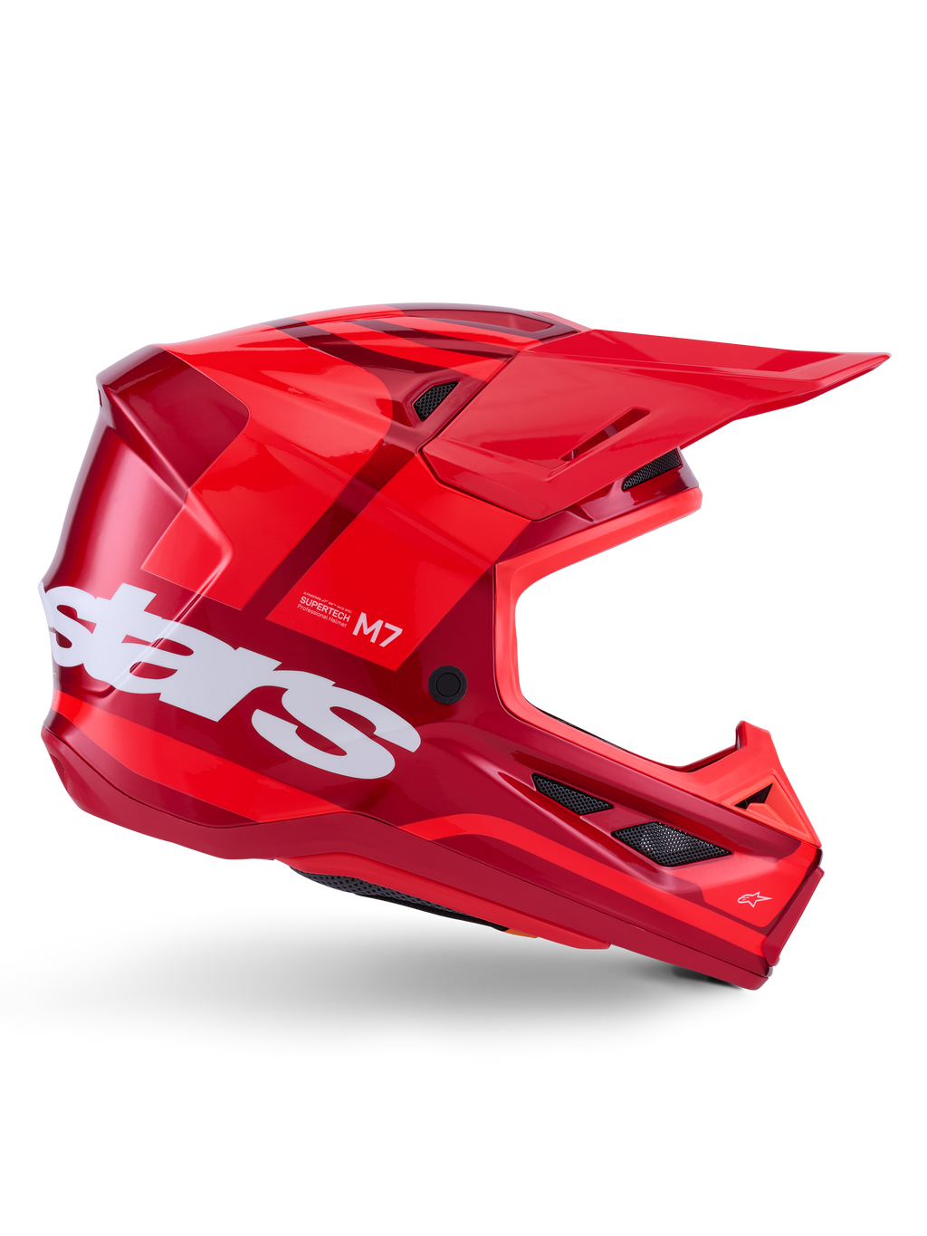 Alpinestars S-M7 Core Helmet, Motocross Helmet, Red Glossy with dark red accents and white branding, side view featuring large white stars logo, aerodynamic shell with mesh ventilation ports and a prominent visor