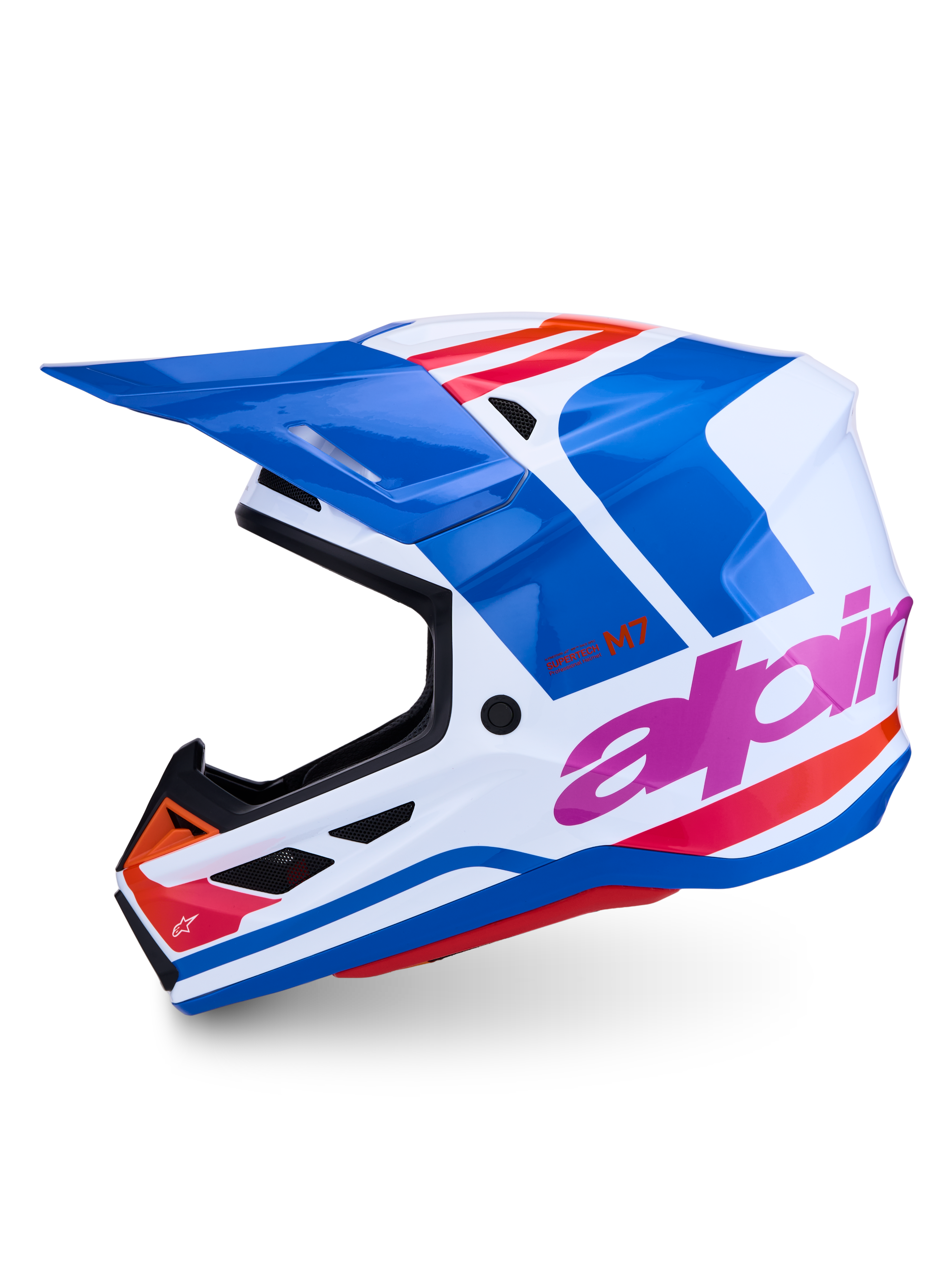Alpinestars S-M7 Core helm, professionele motorcrosshelm, blauw en wit met roze en oranje accenten, glanzende afwerking, ECE-gecertificeerd, lichtgewicht composietconstructie voor off-road racing.