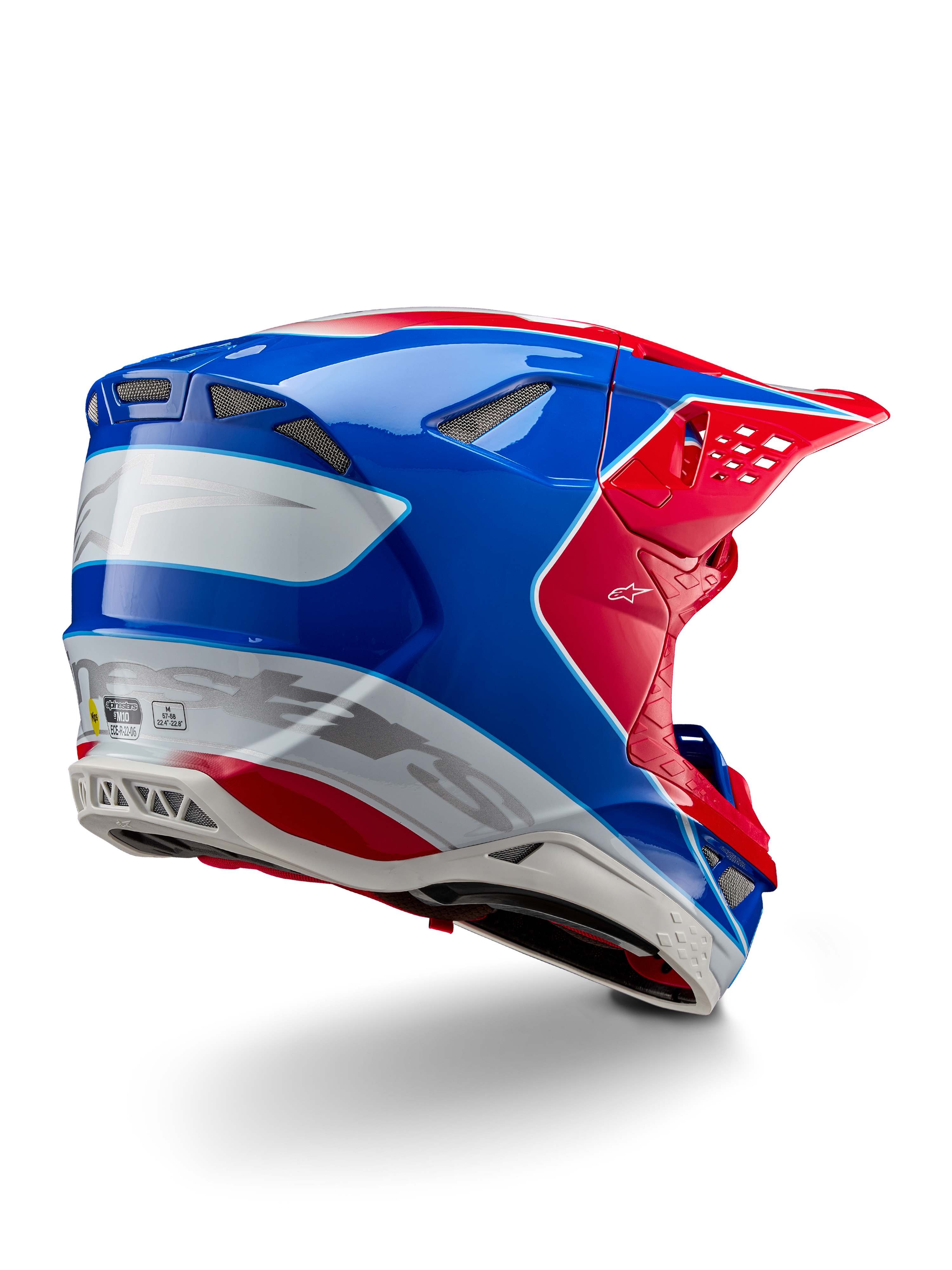 Alpinestars Supertech M10 Aeon ECE 22.06 Helmet, Motocross Helmet, Bright Red Blue and White Glossy, rear-side view featuring an aerodynamic profile, silver Alpinestars branding, and integrated ventilation ports.
