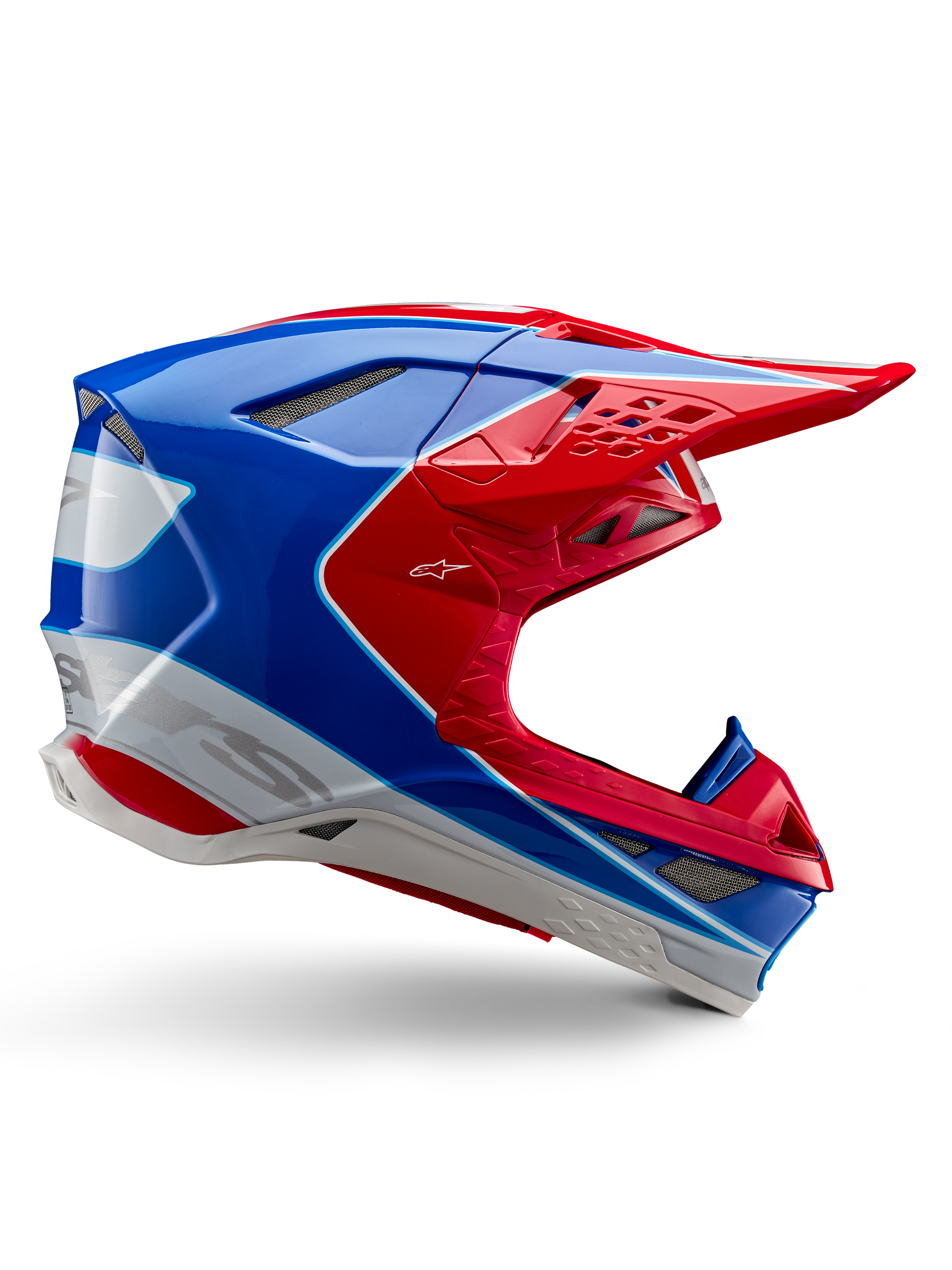 Alpinestars Supertech M10 Aeon helm, motorcrosshelm, felrood, blauw en wit, glanzende afwerking, aerodynamisch zijprofiel met meerdere ventilatieopeningen met gaas, hoekige contouren en klep