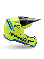 Alpinestars S-M3 Youth Radium helm, motorcrosshelm voor jongeren, fel fluorgeel met zwarte en blauwe accenten, zijaanzicht met aerodynamisch ontwerp, zwarte klep met geel logo, opvallende zwarte merknaam op de zijkant, ECE 22.06 gecertificeerde bescherming voor off-road racen