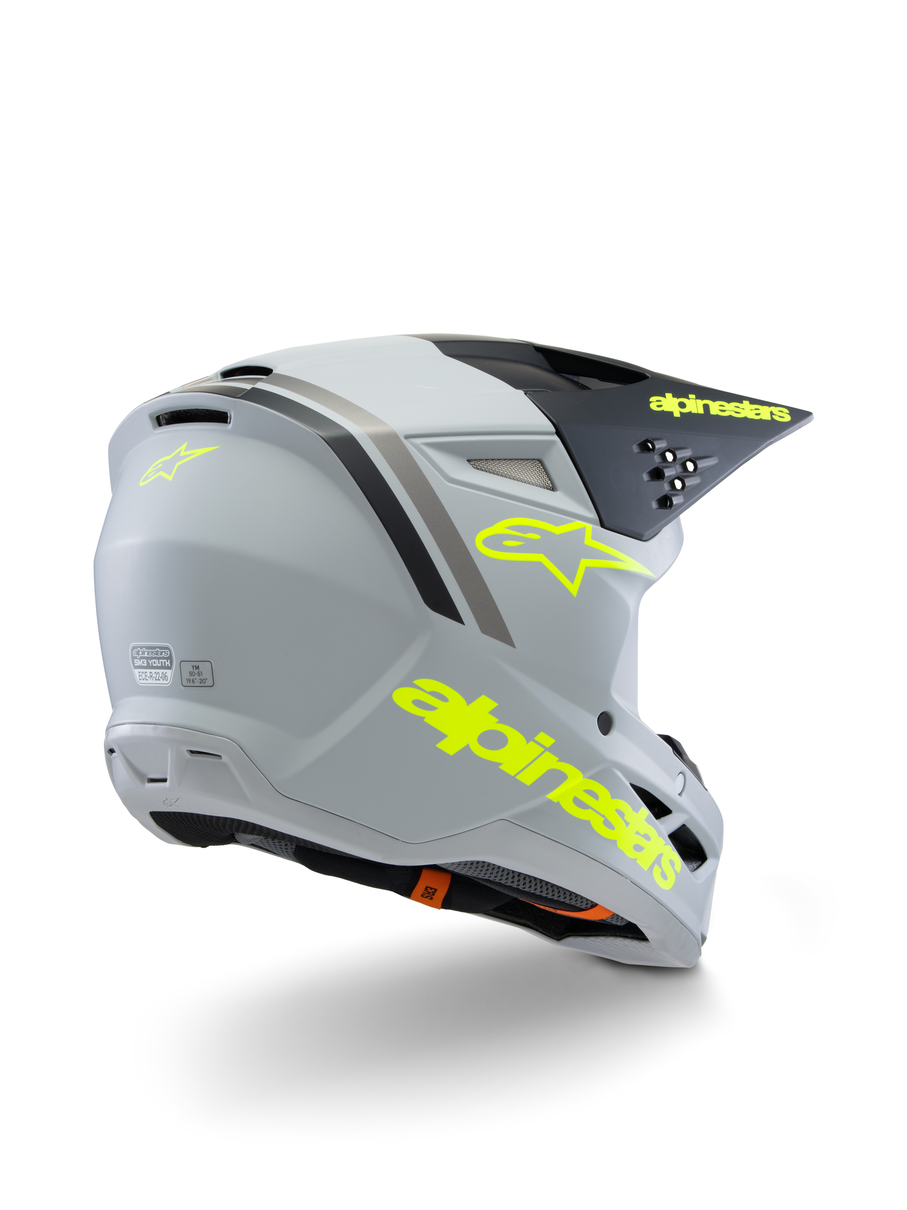 Alpinestars S-M3 Jeugd Radium Helm ECE 22.06, motorcrosshelm, grijs zwart en mat fluogeel, driekwart achteraanzicht met opvallende gele branding en ster-logo, gestroomlijnde aerodynamische schaal met ventilatie voor off-road rijden