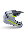 Alpinestars S-M3 Youth Radium helm ECE 22.06, jeugd motorcrosshelm, mat grijs en zwart met neongele branding, zijprofiel met Alpinestars-logo en tekst, aerodynamisch ontwerp met geïntegreerde ventilatie en zwart vizier.