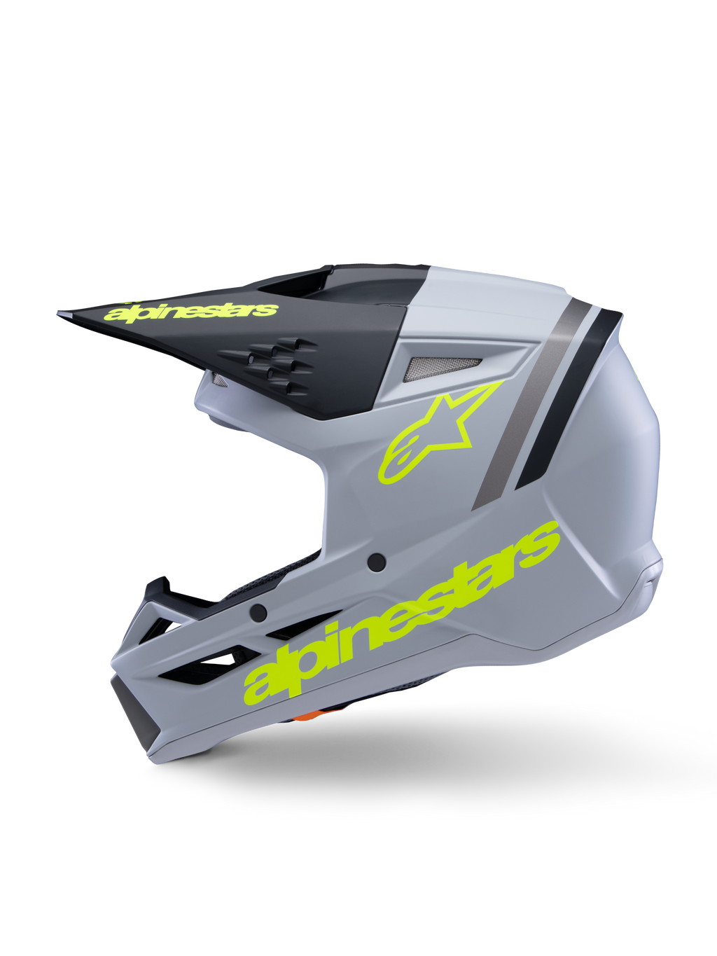 Alpinestars S-M3 Jeugd Radium Helm ECE 22.06, motorcrosshelm, grijs, zwart en mat fluogeel, zijaanzicht met fluorescerend gele Alpinestars-logo's en zwart vizier, gestroomlijnde beschermende uitrusting voor jonge rijders