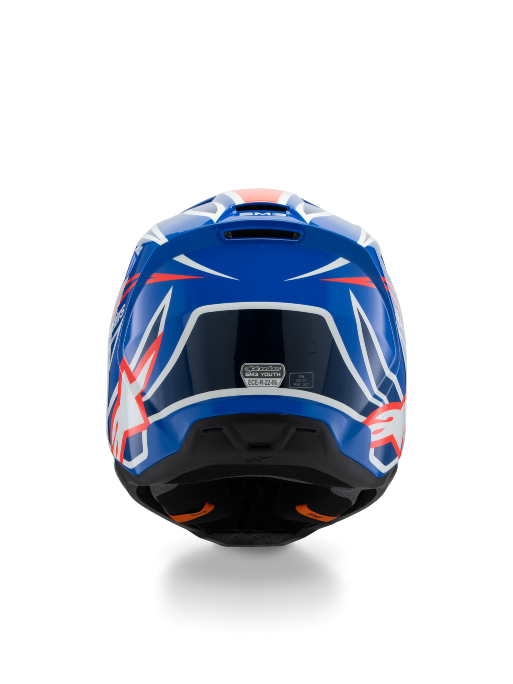 Alpinestars S-M3 Youth Wurx helm ECE 22.06, motorcrosshelm, blauw, rood en wit, achteraanzicht met aerodynamisch ontwerp en ventilatieopeningen, glanzende afwerking met scherpe grafische accenten en veiligheidscertificeringssticker.