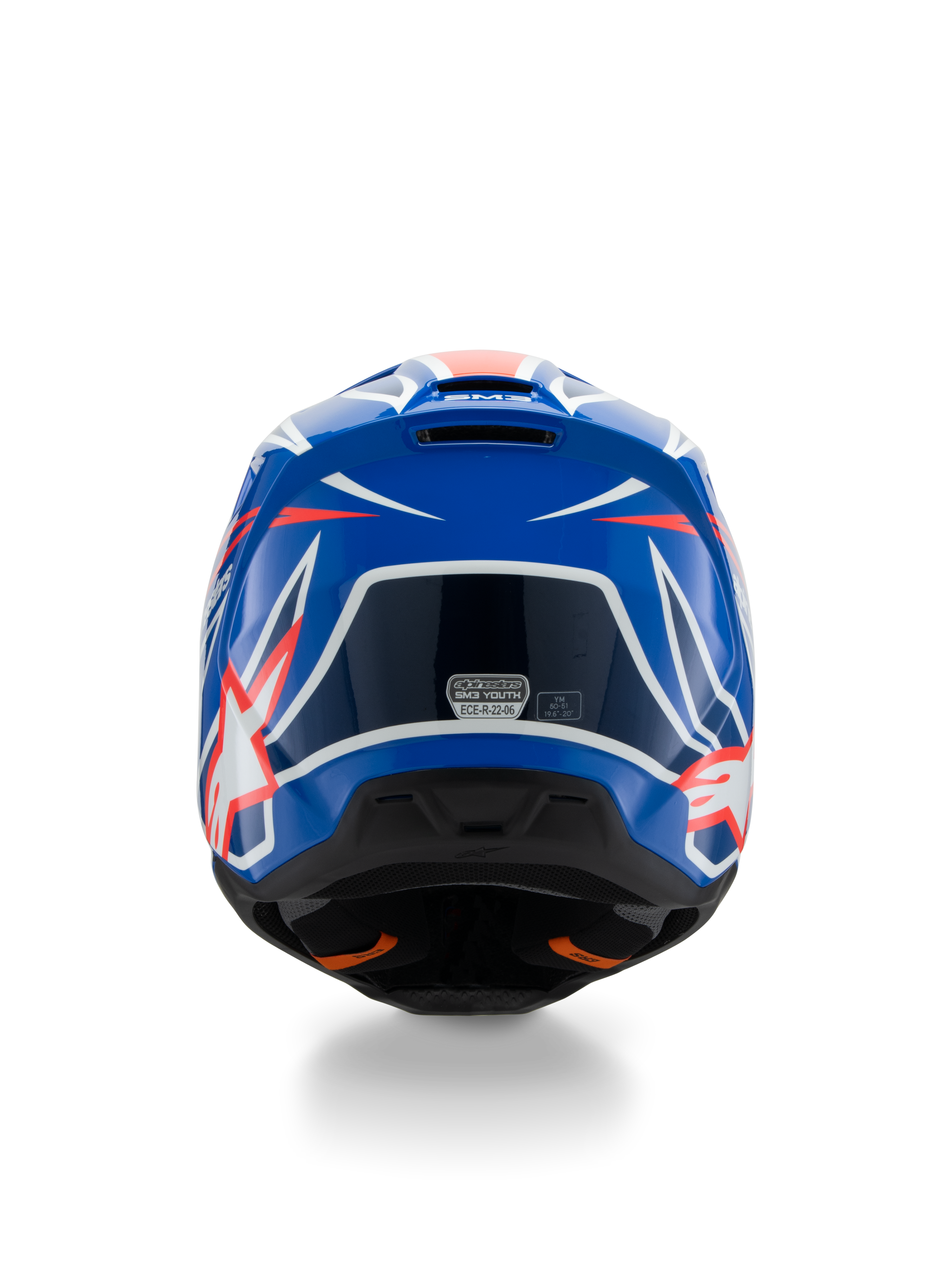 Alpinestars S-M3 Youth Wurx helm ECE 22.06, motorcrosshelm, blauw, rood en wit, achteraanzicht met aerodynamisch ontwerp en ventilatieopeningen, glanzende afwerking met scherpe grafische accenten en veiligheidscertificeringssticker.