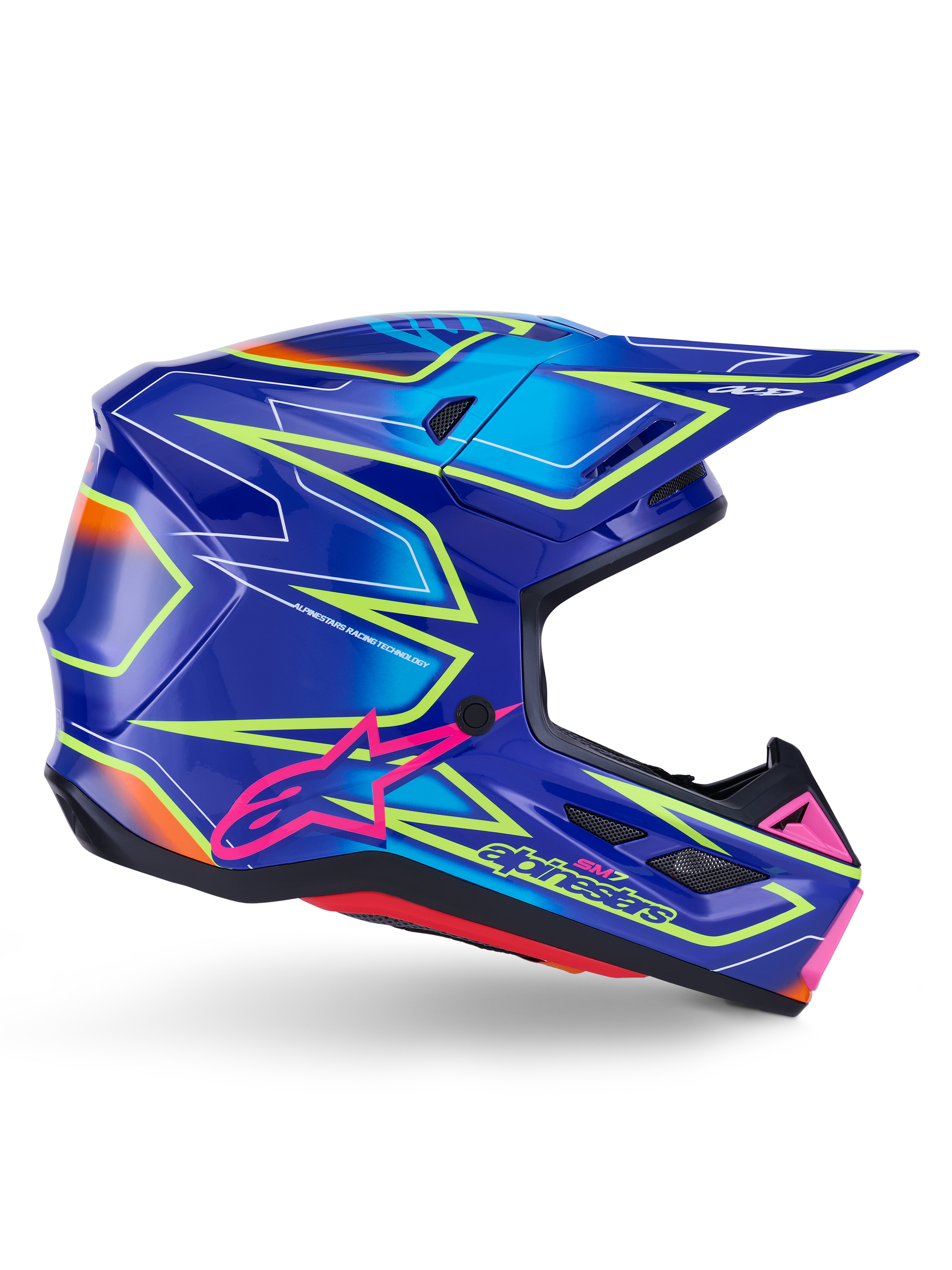Alpinestars S-M7 Cast helm, motorcrosshelm, blauw, roze en fluogeel glanzend, zijaanzicht met opvallende geometrische patronen, roze Alpinestars-logo en geventileerde aerodynamische schaal.