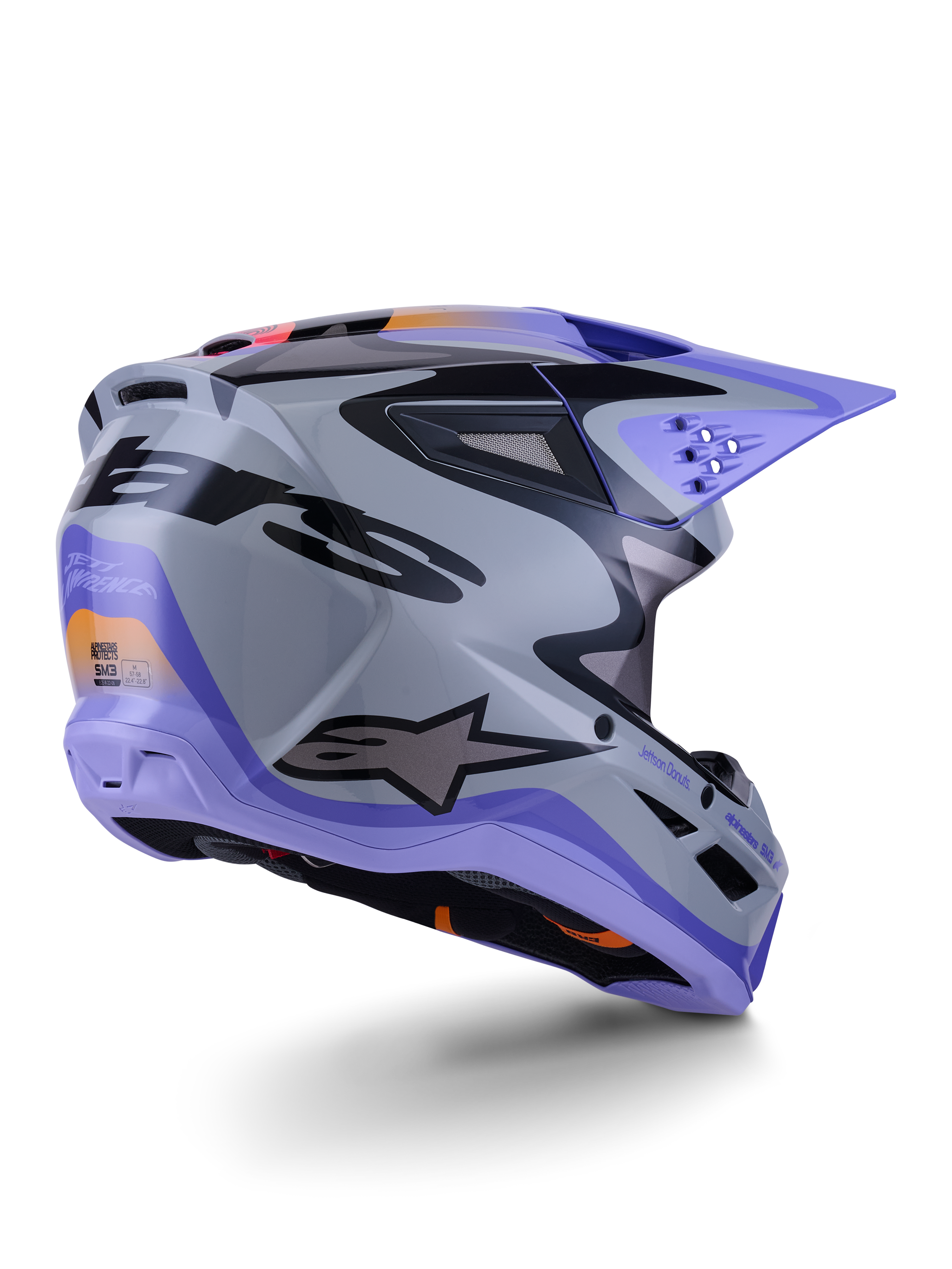 Alpinestars S-M3 Jettson Helm ECE 22.06, motorcrosshelm, grijs, paars en zwart glanzend, driekwart achteraanzicht met aerodynamische thermo-geïnjecteerde schaal, ventilatieopeningen en opvallend grafisch ontwerp