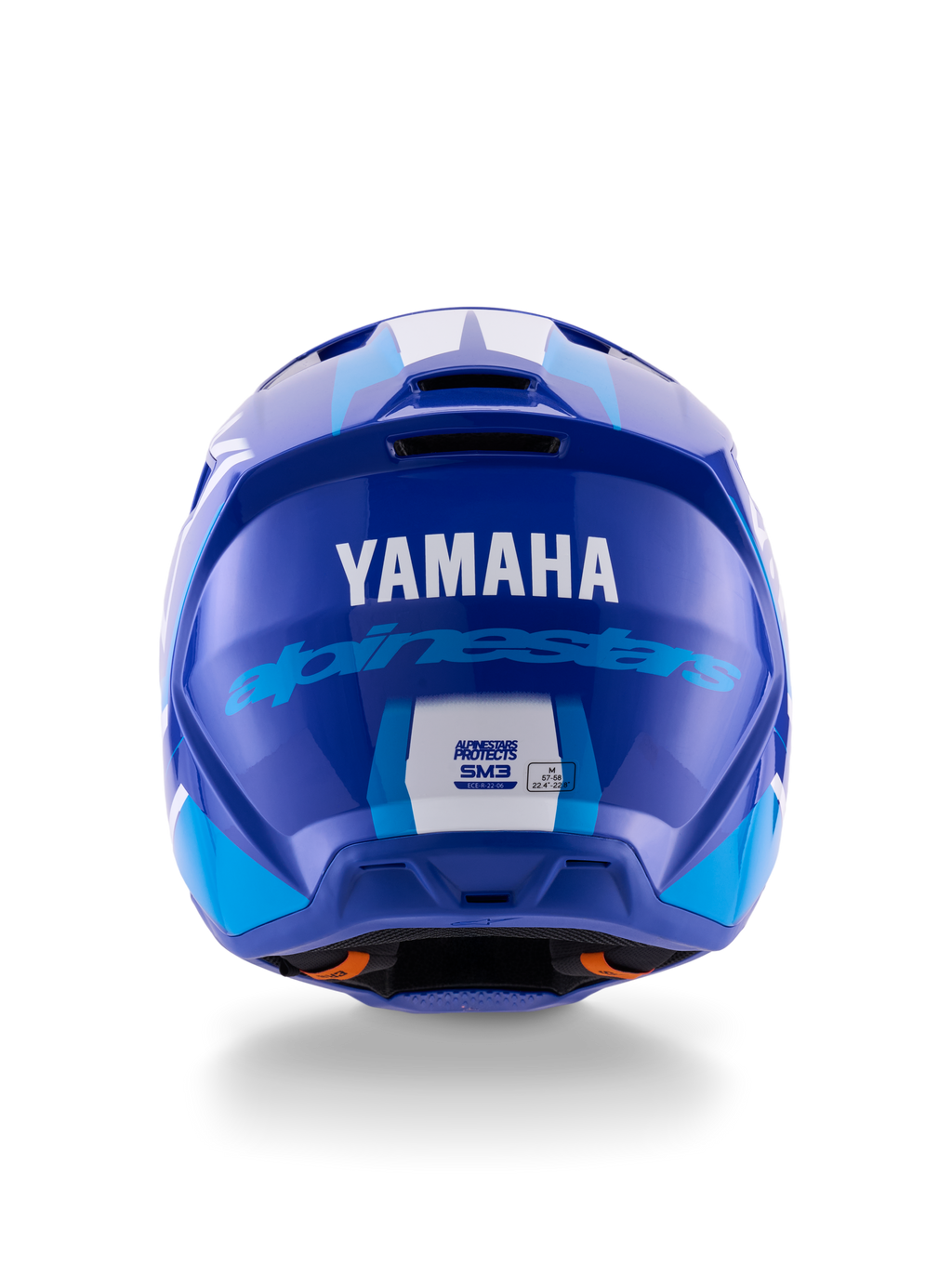 Alpinestars Yamaha S-M3 helm, motorcrosshelm, blauw wit glanzend, achteraanzicht met wit YAMAHA-logo en blauwe Alpinestars-tekst, strakke glanzende afwerking met zichtbare ventilatiepoorten en veiligheidscertificeringslabels.