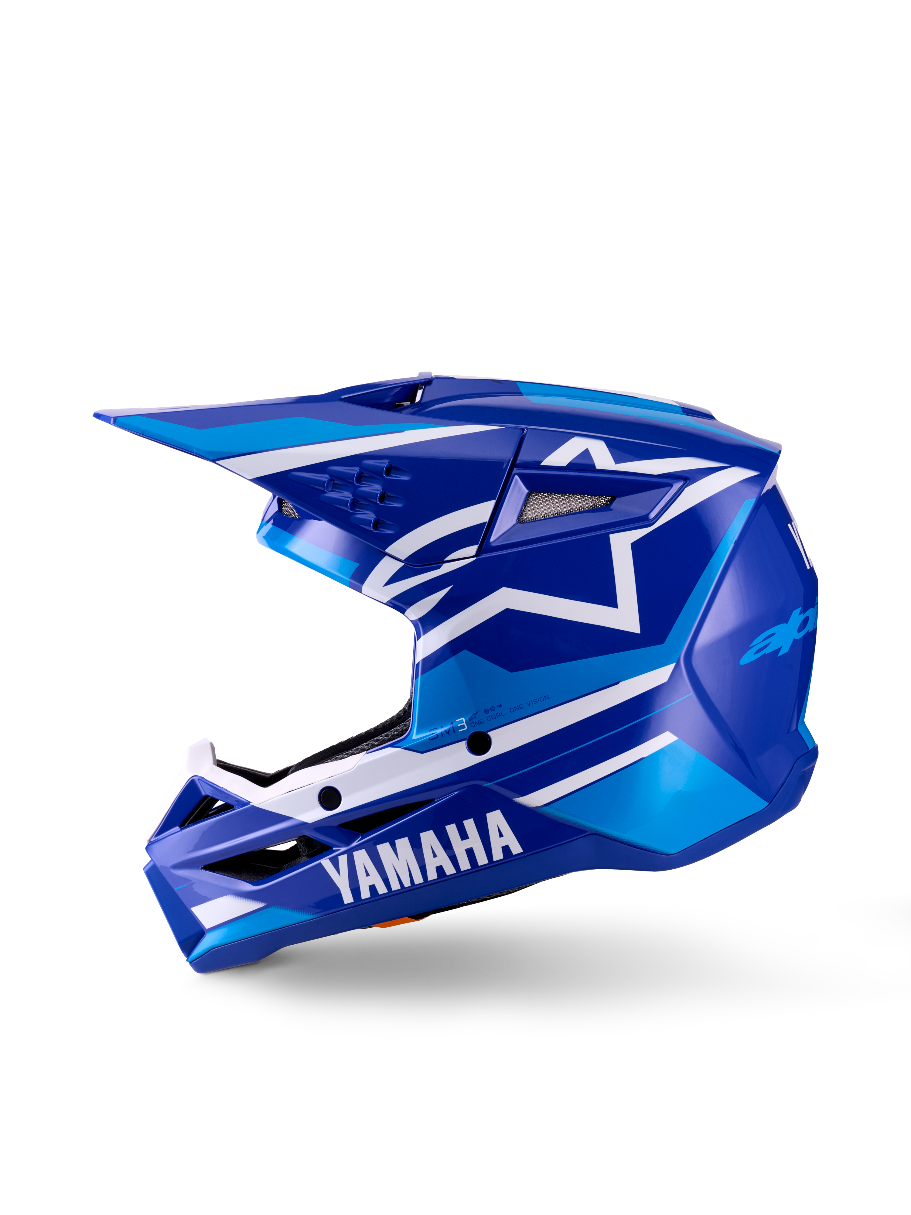 Yamaha S-M3 Youth Motocross Helmet, jeugd motorcrosshelm, blauw wit glanzend, zijaanzicht, met opvallende Yamaha-branding op de kinbeschermer en Alpinestars ster-logo, gestroomlijnde aerodynamische schaal met meerdere ventilatieopeningen en geïntegreerde klep.