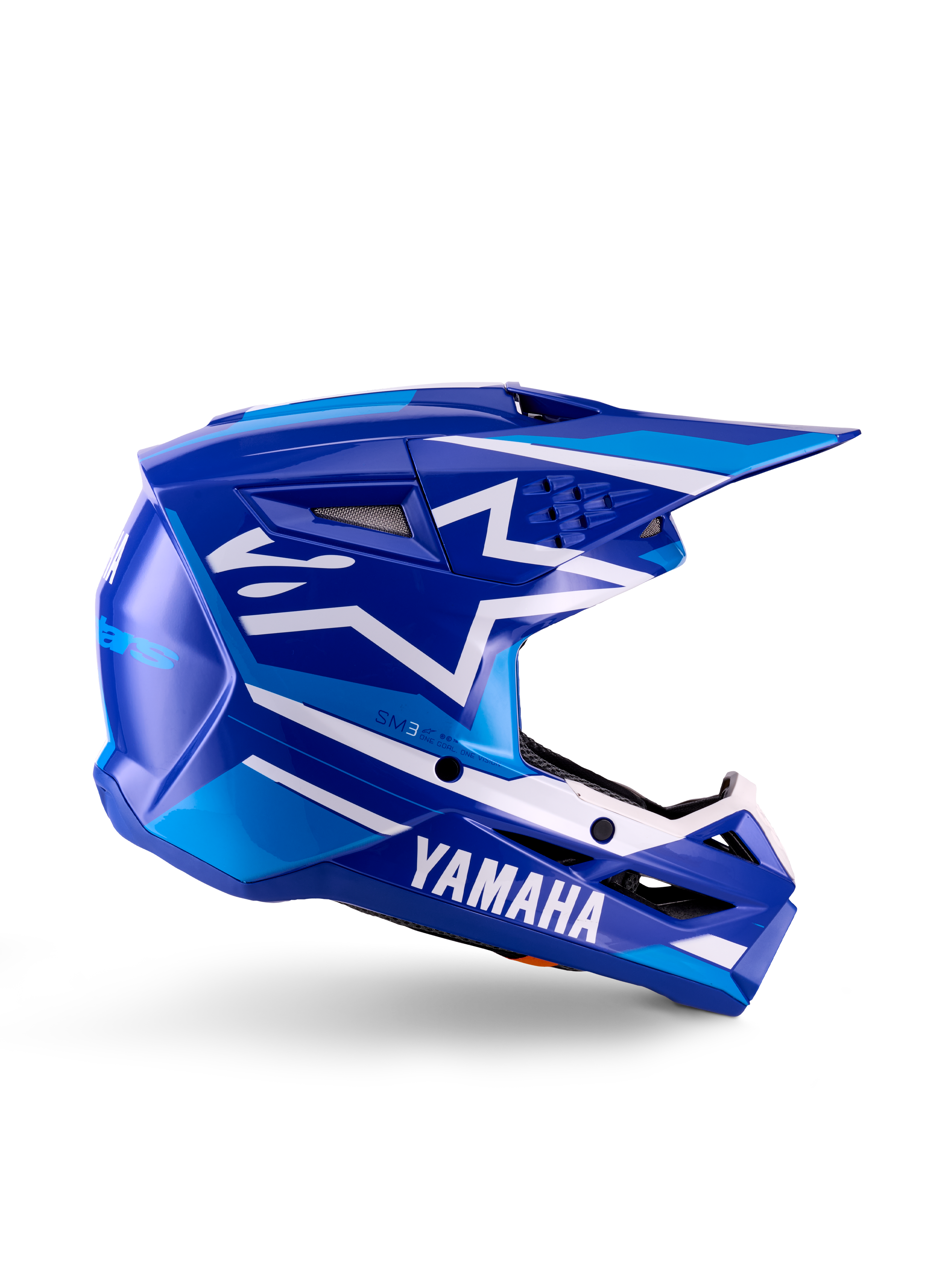 Yamaha S-M3 jeugd motorcrosshelm, blauw en wit glanzend, zijprofiel met opvallende Yamaha-branding en Alpinestars-sterlogo, geometrisch ontwerp met lichtblauwe accenten, geventileerde schaal met lang vizier, ECE 22.06 gecertificeerde off-road hoofdbescherming