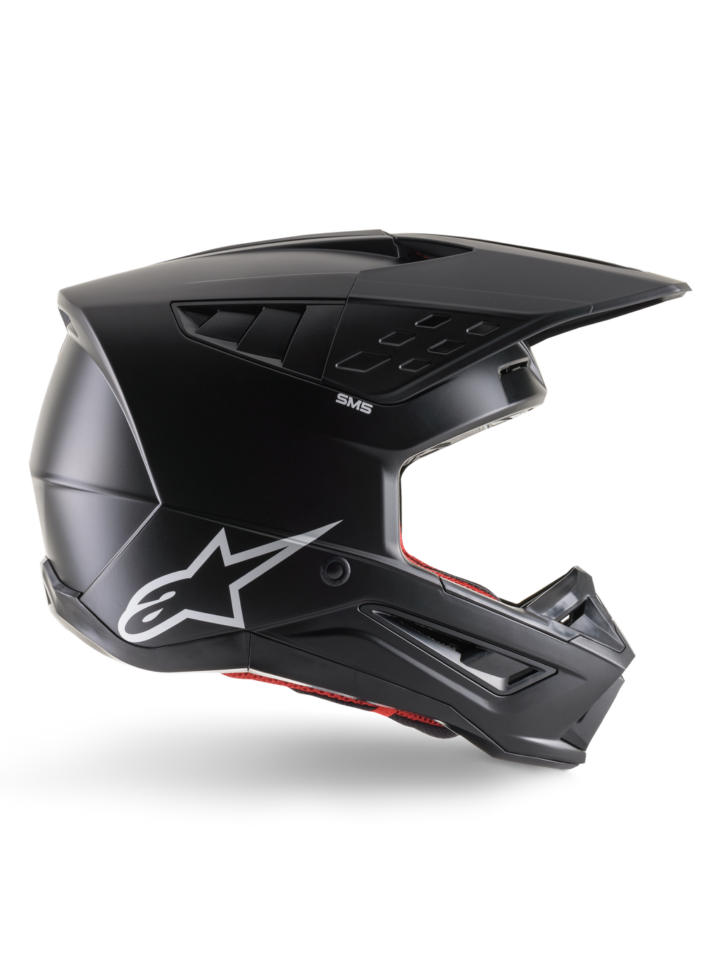 Alpinestars S-M5 Solid Helmet, Motocross Helmet, Matte Black, featuring white Alpinestars star logo and red interior lining, aerodynamic design with multiple air vents and long visor, ECE 22.06 certified off-road protection