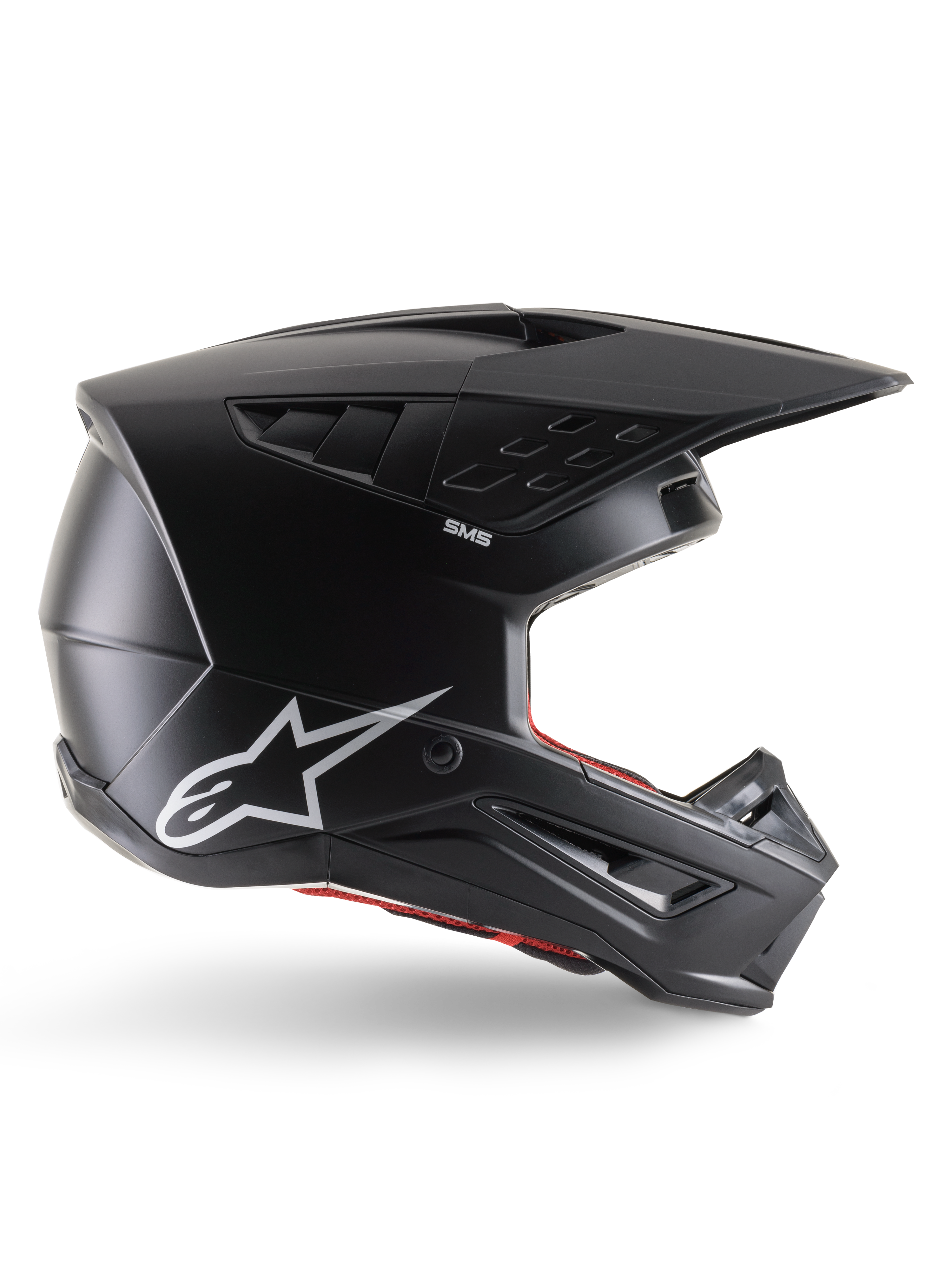 Alpinestars S-M5 Solid helm, motorcrosshelm, matzwart, voorzien van wit Alpinestars sterlogo en rode binnenvoering, aerodynamisch ontwerp met meerdere ventilatieopeningen en lang vizier, ECE 22.06 gecertificeerde off-road bescherming