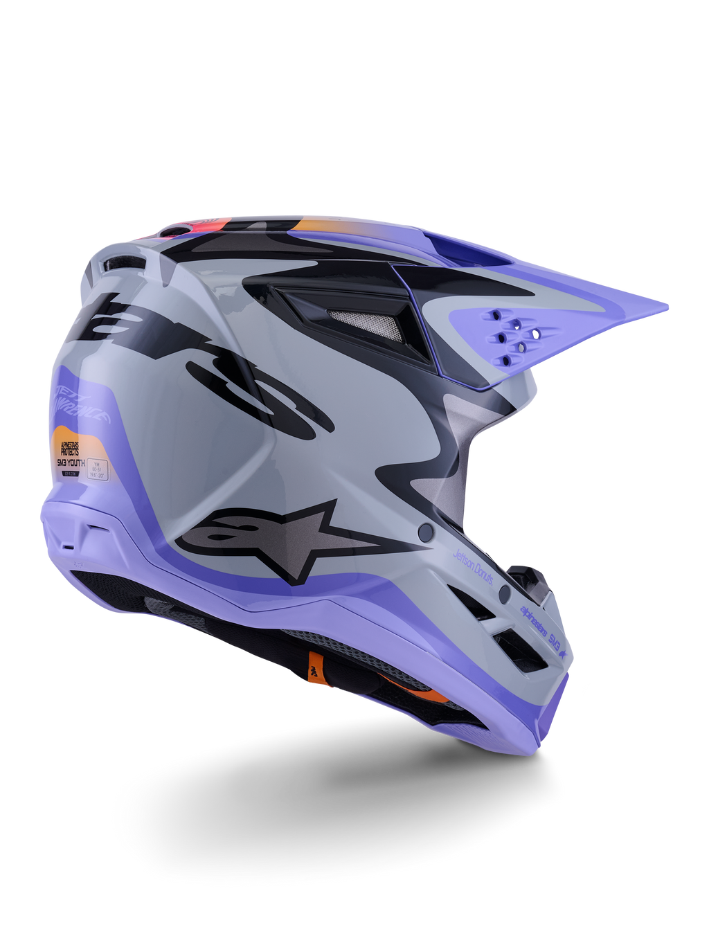 Alpinestars S-M3 Jettson jeugdhelm, motorcrosshelm, grijs, paars en zwart glanzend, driekwart achteraanzicht, voorzien van een paars vizier, zwart Alpinestars-logo en meerdere ventilatieopeningen, strak ontwerp voor off-road racen voor de jeugd