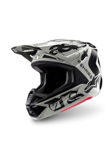 Alpinestars Limited Edition S-M7 Wolf Dust Helmet, Motocross Helmet, Dune Black Glossy, light gray shell with black gothic 'ASTARS' lettering and star logo, red bottom rim accent, featuring a high-performance visor and multiple air intake vents, three-quarter front view