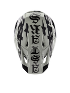 Alpinestars Limited Edition S-M7 Wolf Dust Helmet, top view, Dune and Black glossy finish, featuring bold gothic-style typography across the crown and One Goal One Vision detailing, professional motocross racing head protection