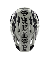 Alpinestars Limited Edition S-M7 Wolf Dust Helmet, top view, Dune and Black glossy finish, featuring bold gothic-style typography across the crown and One Goal One Vision detailing, professional motocross racing head protection
