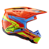 Alpinestars S-M5 Action 2 Helmet ECE, Motocross Helmet, Orange Fluo Cyan and Yellow Fluo, side profile view featuring vibrant glossy graphics, Alpinestars star logo, multiple air vents, and an aerodynamic peak visor.