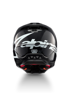 Alpinestars S-M5 Corp helm, motocrosshelm, donkergrijs glanzend en wit, achteraanzicht met groot logo, ECE 22.06-gecertificeerd