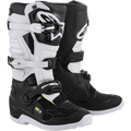 Alpinestars Stella Tech 3 dameslaarzen, motorcross off-road laarzen, zwart en wit, voorzien van een sluitingssysteem met drie gespen, witte TPU-scheenplaten met Alpinestars-branding, zwart microvezel bovenwerk met witte panelen, witte zolen, beschermend performance-schoeisel voor vrouwelijke rijders