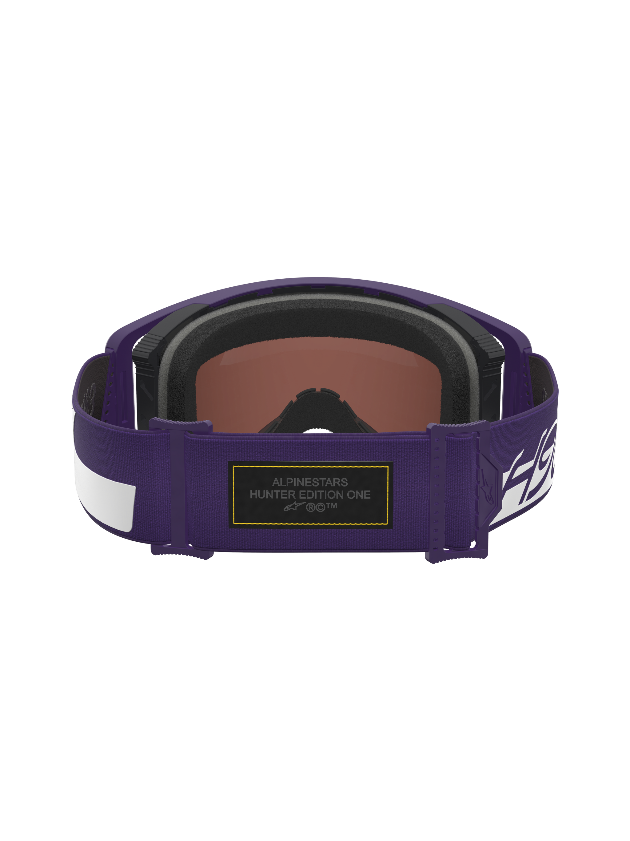Alpinestars Limited Edition HUNTA96 XXV Supertech Vision Goggles, paars en wit, achteraanzicht van de verstelbare band met zwarte Alcantara-patch met geel contraststiksel en Hunter Edition One-branding, premium motorcrossbril geïnspireerd op de Porsche GT3RS