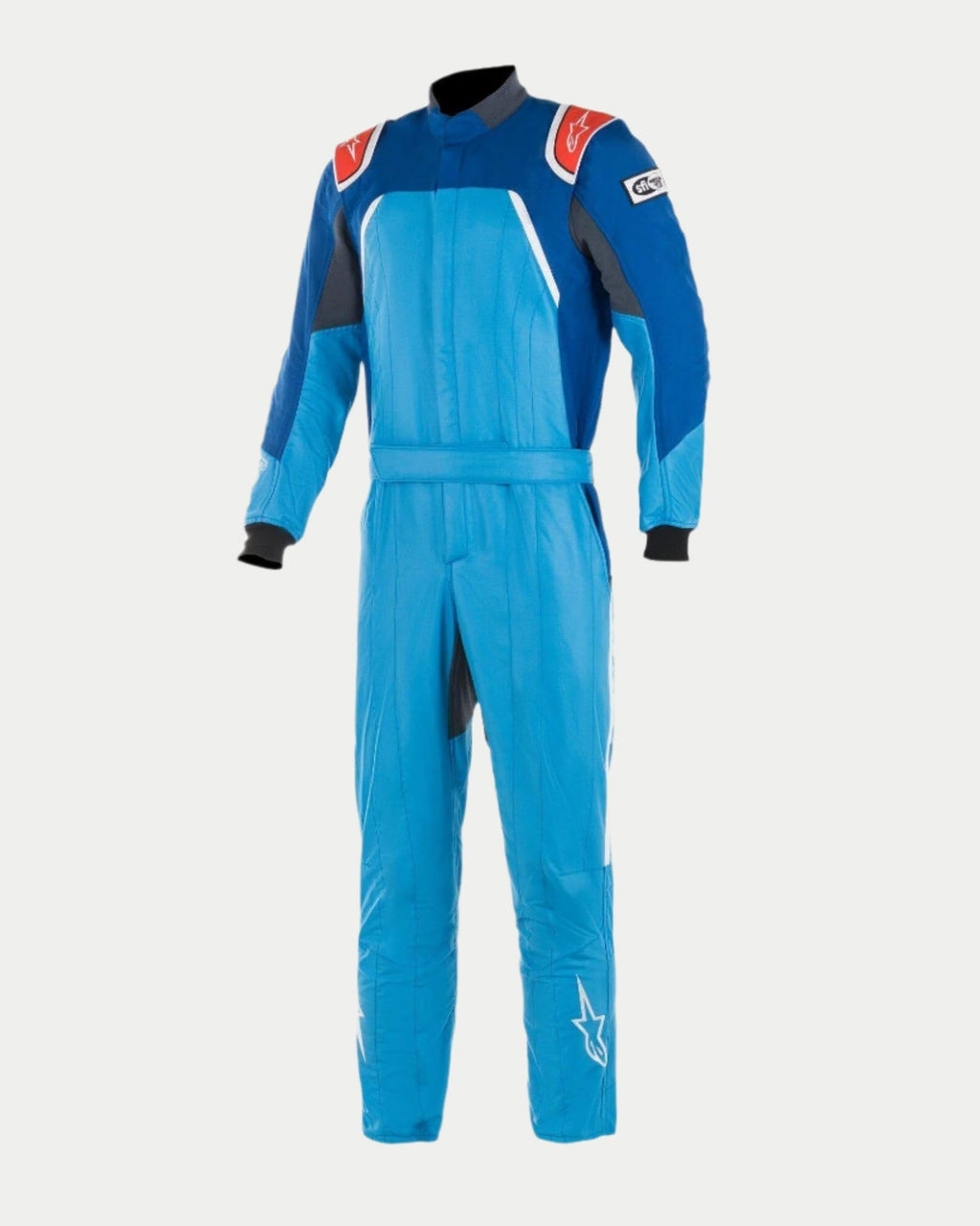 Alpinestars GP Pro Comp Bootcut Suit FIA, Professional Auto Racing Suit in Cobalt Blue, Royal Blue, and Red, featuring a three-layer aramidic construction, shoulder epaulettes, and a bootcut leg design with white star logos.