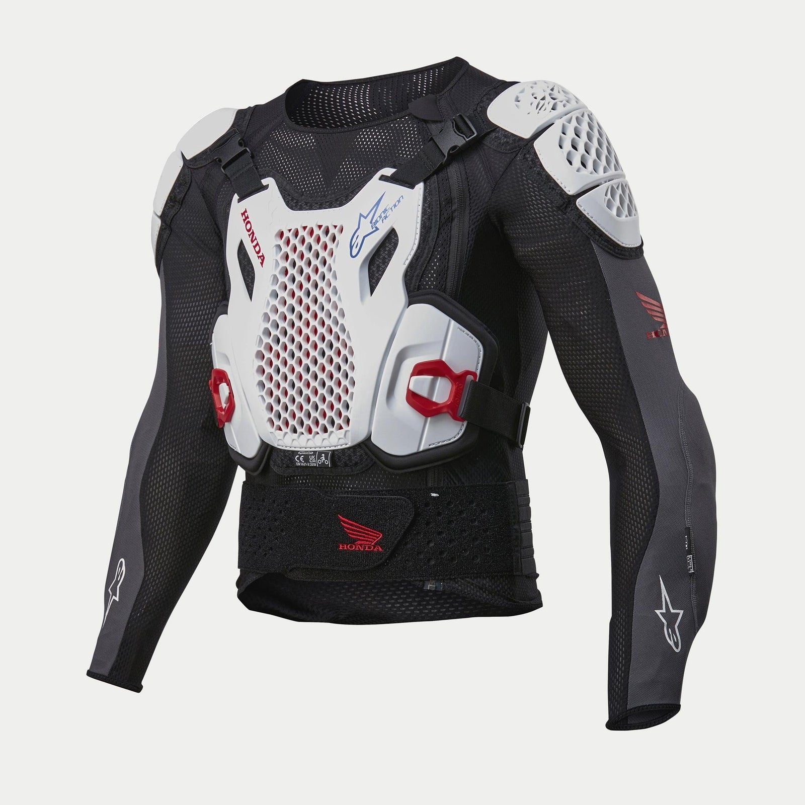 Alpinestars Honda Bionic Plus V2 Protection Jacket, Motocross Protective Armor, Black White and Red, featuring a perforated white CELL Technology chest plate, white honeycomb shoulder protectors, and breathable mesh sleeves with Alpinestars and Honda logos.