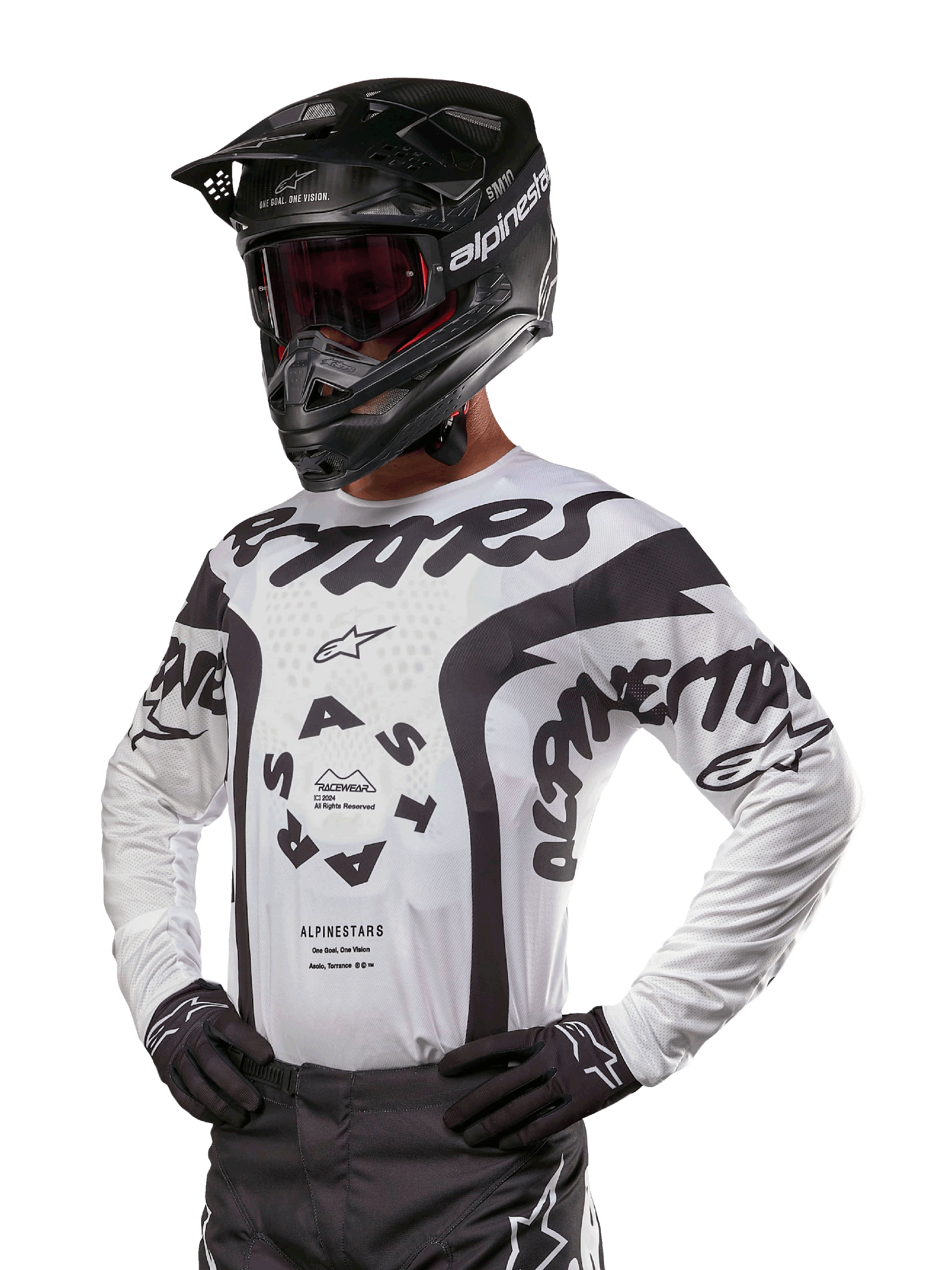 Alpinestars 2024 Racer Hana Jersey, Motocross Racing Jersey, White and Black, bold graphics with Alpinestars and Astars branding, worn with black helmet and black gloves, performance off-road MX gear